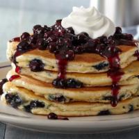 Pancake Combo · 730-1100 cal. Choice of any two same-flavored pancakes, two eggs*, two bacon or sausage and ...