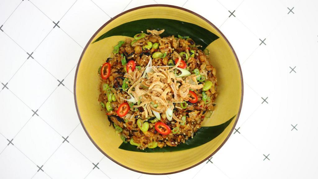 Tempeh “Chaufa” Rice (Plant Based) · Peruvian style stir fried rice with tempeh, edamame and crispy onions