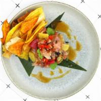 Spicy Tuna  · Yellowfin tuna, jalapeño, assorted citrus & spicy lemon dressing