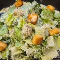 Caesar Salad · Romaine hearts, cotija cheese, hand cut garlic crouton, huacatay caesar dressing