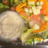 House Salad · Green Mix, cucumber, tomato, carrots and homemade ranch vinaigrette
