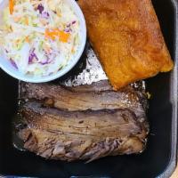 Smoke Beef Brisket · Slow-cooked certified angus beef(1/2lb). Served with fresh cut cabbage coleslaw and roasted ...