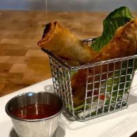 Spring Rolls · 3 vegetable spring rolls with sweet chili sauce.