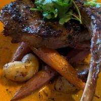 Lamb Chops · Served with jasmine rice. Grilled tender lamb chops rubbed with house spices, served with gr...