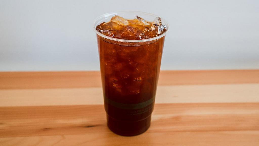Cold Brew Iced Coffee · Brewed locally by press coffee. Cold-brew comes black and unsweetened!
