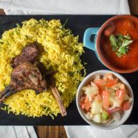 Lamb Chops (2 Pc) · Lamb chops seasoned with parsley and pepper with Rice