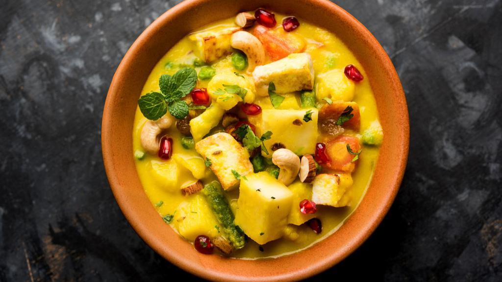 Vegetable Korma · Assorted seasonal fresh cooked in yogurt, cream, mild spices with raisins and nuts.