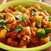 Aloo Gobi · Fresh cauliflower and sautéed potatoes cooked dry with spice and tomato.