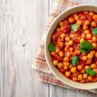 Chana Masala · Fresh garbanzo beans spiced with fresh ginger and served in its own sauce.