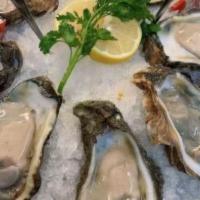 Steam Oyster · Oyster is first steamed then seasoned with one of our special seasoning.