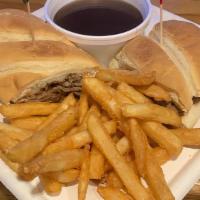 French Swiss Dip · Lean roast beef layered on a toasted French roll and smothered with Swiss. Served with au jus.