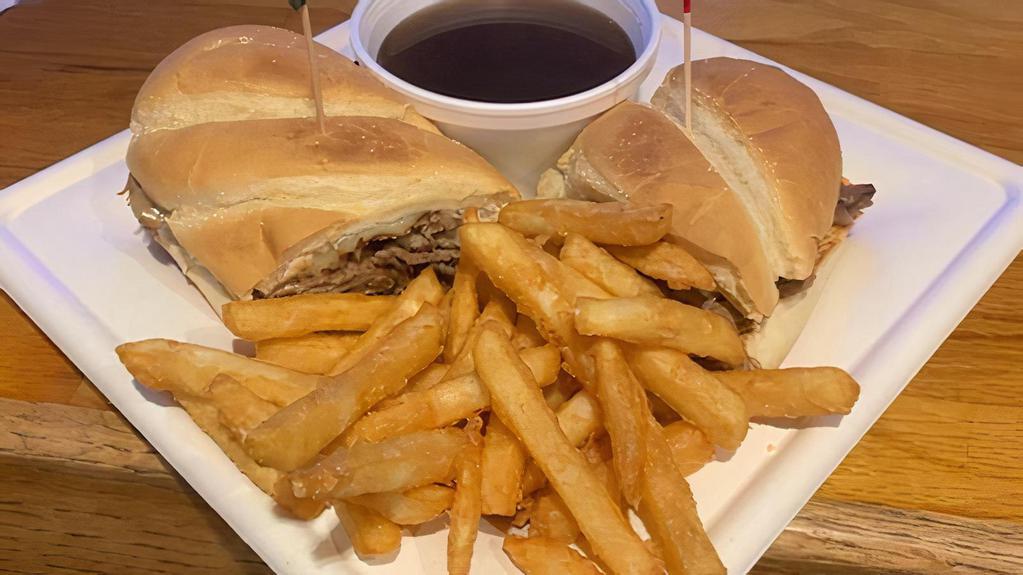 French Swiss Dip · Lean roast beef layered on a toasted French roll and smothered with Swiss. Served with au jus.