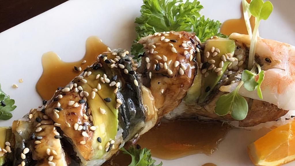 Dragon Roll · Spicy tuna inside topped with eel, avocado and eel sauce. Raw fish.