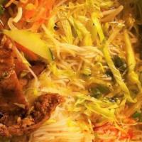 Hu Tieu Dac Biet · Combination Rice Noodle W pork soup.