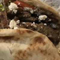 Greek Gyro · House seasoned lamb gyro slices, lettuce, onions, tomatoes, sprinkled feta and dill infused ...