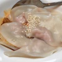 Steamed Dumplings With House Sauce / 钟⽔饺 · Mild Spicy.