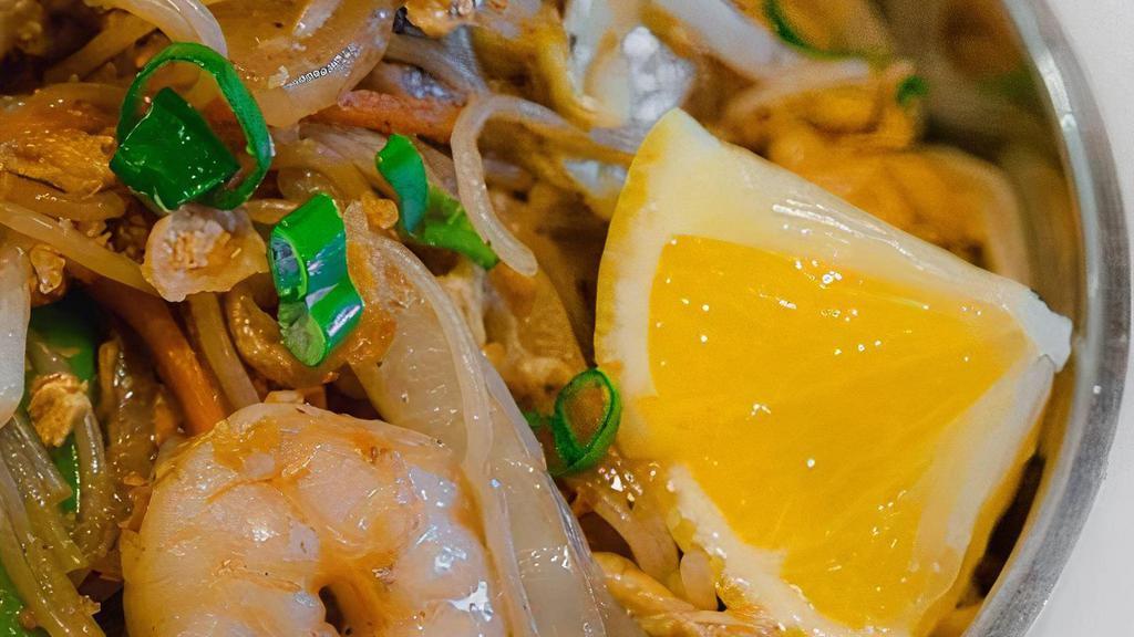 Kj'S Signature Pancit Bowl · Stir-fried noodles with shrimp, chicken, longanisa, egg, and veggies.