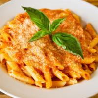 Penne Vodka · Delicious penne pasta with vodka sauce, topping, served with side salad and bread.