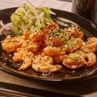 Dynamite Shrimp · Flash fried with pickled cucumbers, scallions & sesame seeds.