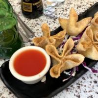 Crab Cheese Wonton (6) · Creamy cheese blended with crab and green onions.