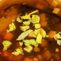 Hot And Sour Soup · Spicy. This soup is plenty with tofu, bamboo shoots, carrots, egg, and tree mushrooms.