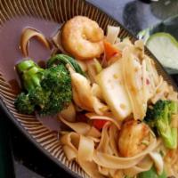 Drunken Noodles · Spicy. Chicken, beef or tofu or shrimp. Flat rice noodles with basil, bean sprouts, and gree...