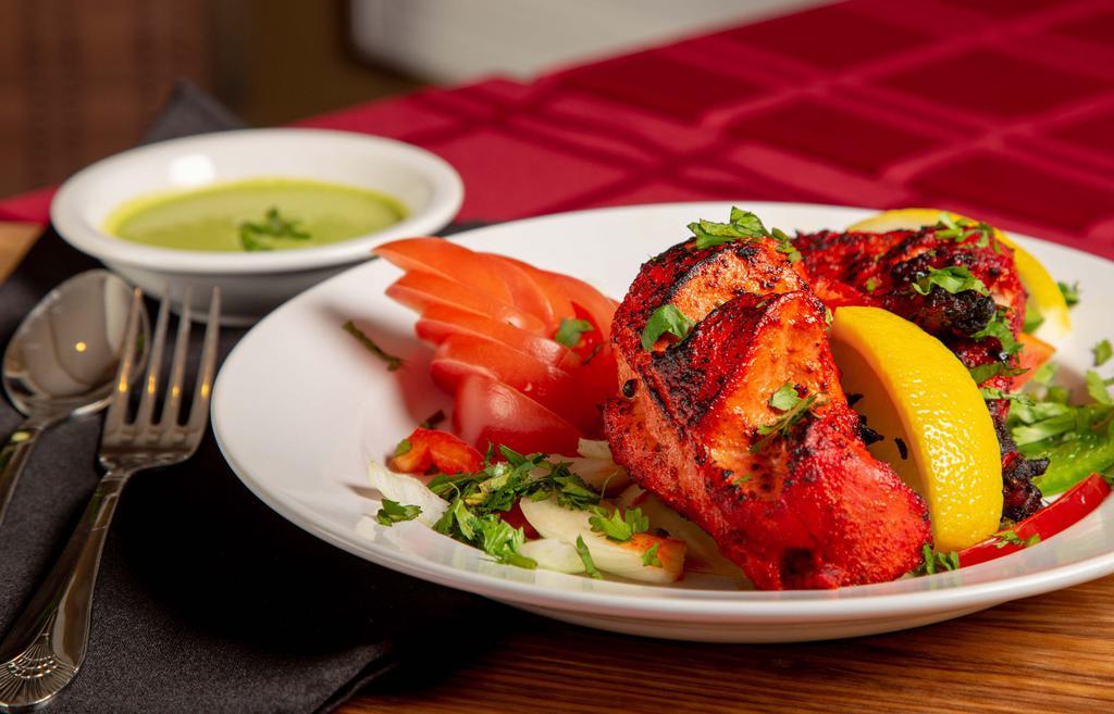 Tandoori Mixed Grill · Assorted chicken and lamb meat minced in herbs and spices grilled, hot on platter.