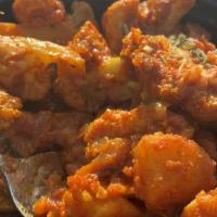 Aloo Gobi · Cauliflower and potatoes cooked with spices and onions.
