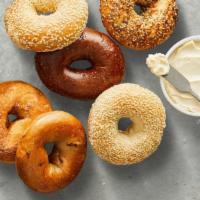 Bagel Bundle · Six freshly baked bagels and one tub of cream cheese of your choice at a discounted price.