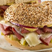 Hot Pastrami · Pastrami, double melted swiss, red onion, diced pickle, and spicy brown mustard on an everyt...