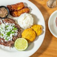 Bistec Cubano
 · Tenderized, grilled flap meat steak marinated cuban style, served with chimichurri sauce, to...