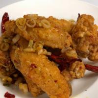 Crispy Chicken Wings With Garlic & Chili Pepper (8) · Hot and spicy.
