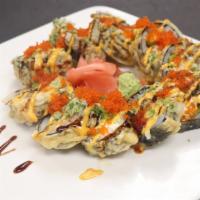 Monster Roll · Hot and spicy. Eel, avocado, crab meat, white fish, shrimp and cream cheese deep fried. Topp...