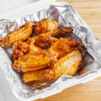 4 Pieces Whole Wings With Fries · Choose from a variety of flavors. Served with one dipping of ranch or blue cheese.