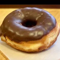 Chocolate Raised Ring · Plain raised ring donut covered in chocolate icing.