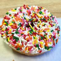 Rainbow Sprinkle Cake (Vanilla) · Plain cake donut covered with vanilla frosting and topped with rainbow sprinkles.