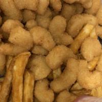 Popcorn Shrimp Basket · The basket comes with Cajun fries or substitutes onion rings for an additional charge.