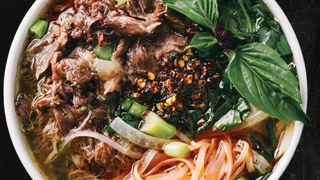 Spicy Oxtail Pho~ · Can you handle Mom's heat? . Uses the highest quality hand-pulled Oxtail meat pulled straight from the bone. (Served with Spicy Oxtail Beef Broth)