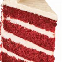 Red Velvet Skyscraper · Red velvet cake layered with layers of cream cheese icing. Topped with buttercream rosettes,...