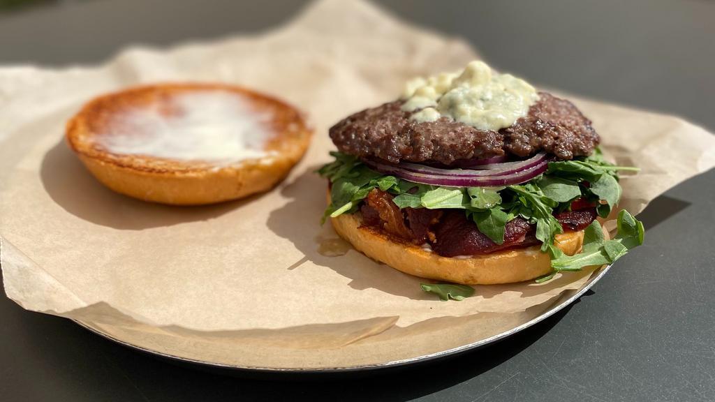 Bd Street Burger · Maytag blue cheese, smoked bacon, arugula, red onion, and mayonnaise.