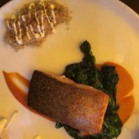 Salmone · Pan seared salmon, roasted red pepper sauce, quinotto, crispy prosciutto, broccoli rabe, pre...