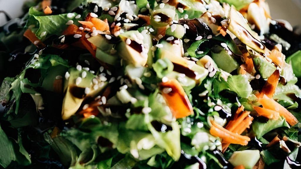 California Salad · chopped field greens, cucumber, avacado, shreded carrot, green onion with sesame dressing