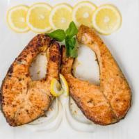 Grilled Salmon · Two pieces of marinated salmon that comes with a side of vegetables. An optional side of ric...