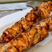 Chicken Kabob · Pieces of marinated chicken in herbs and spices, broiled on char grill. Comes with Basmati r...