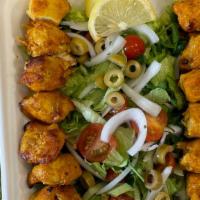 Chicken Salad · Chunks of marinated boneless chicken in herbs & Spices, broiled over char grill and serves w...