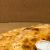 Rudy'S Special Calzone (Large) · Grilled chicken, mushrooms, onions, broccoli and hot peppers.
