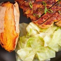 Bourbon Chicken · Sweet and tangy chicken breast, paired with sweet potatoes and sautéed cabbage. 369 calories.