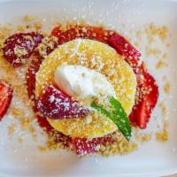 Mascarpone Cheesecake · Seasonal Fruit, Vanilla Crema, Pistachio Streusel.