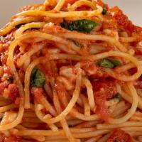Spaghetti Pomodoro · Grape tomatoes, basil, mozzarella, Grana Padano Zanetti.