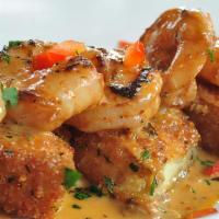 Shrimp & Eggplant · Appetizer. Pan seared shrimp, crispy eggplant, black pepper cream sauce.